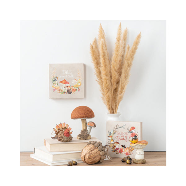 Autumn Mushroom Figurine on display