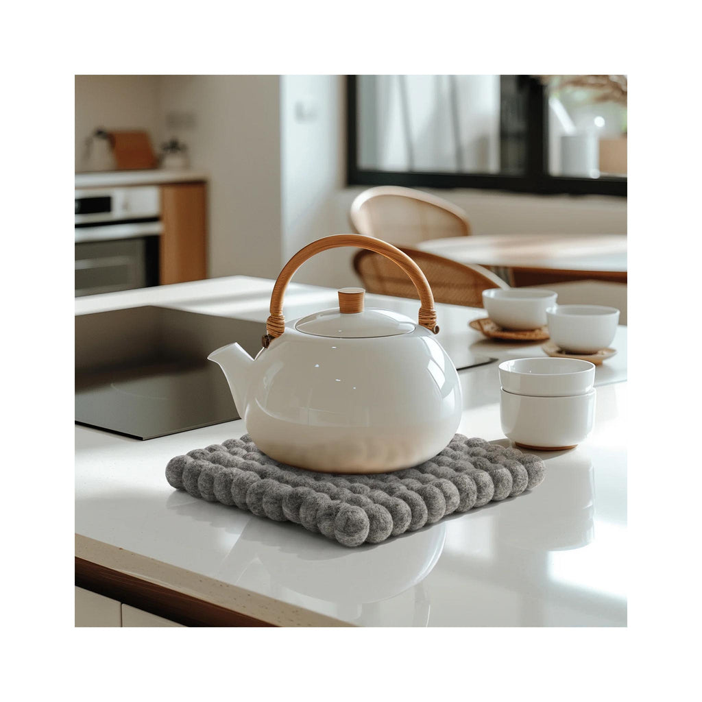 ModWool Felt Ball Trivets - Square - Lt. Grey in use