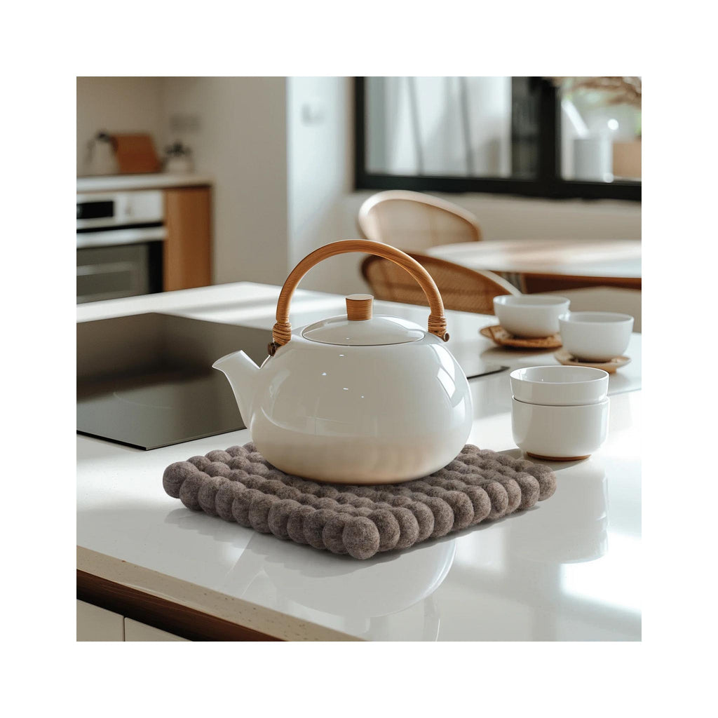 ModWool Felt Ball Trivets - Square - Lt. Brown in use