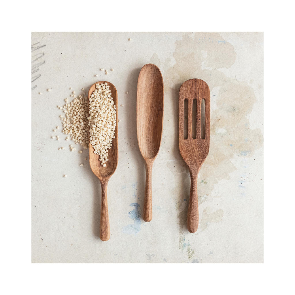 Hand-carved Doussie Wooden Spoon/Scoop - in use