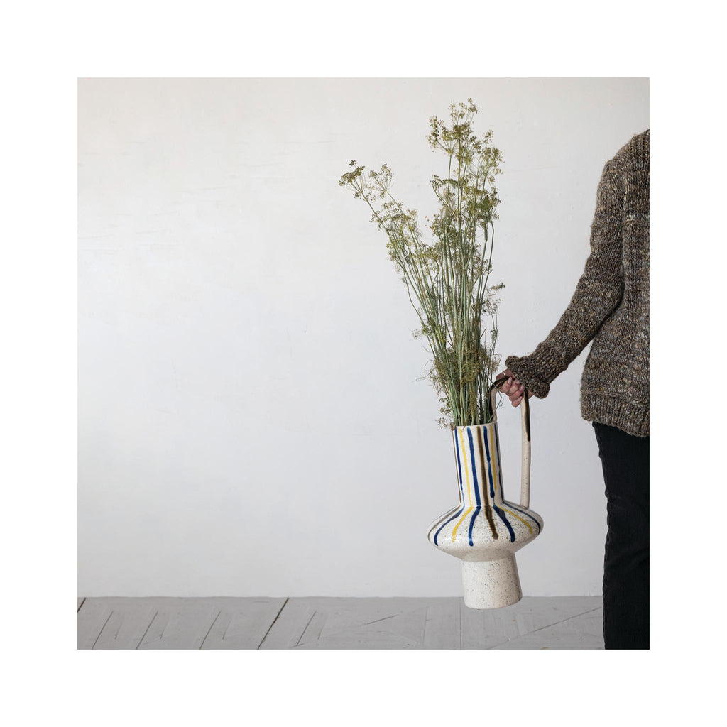 Reactive Glaze Speckled Stoneware Vase with Handle - being held