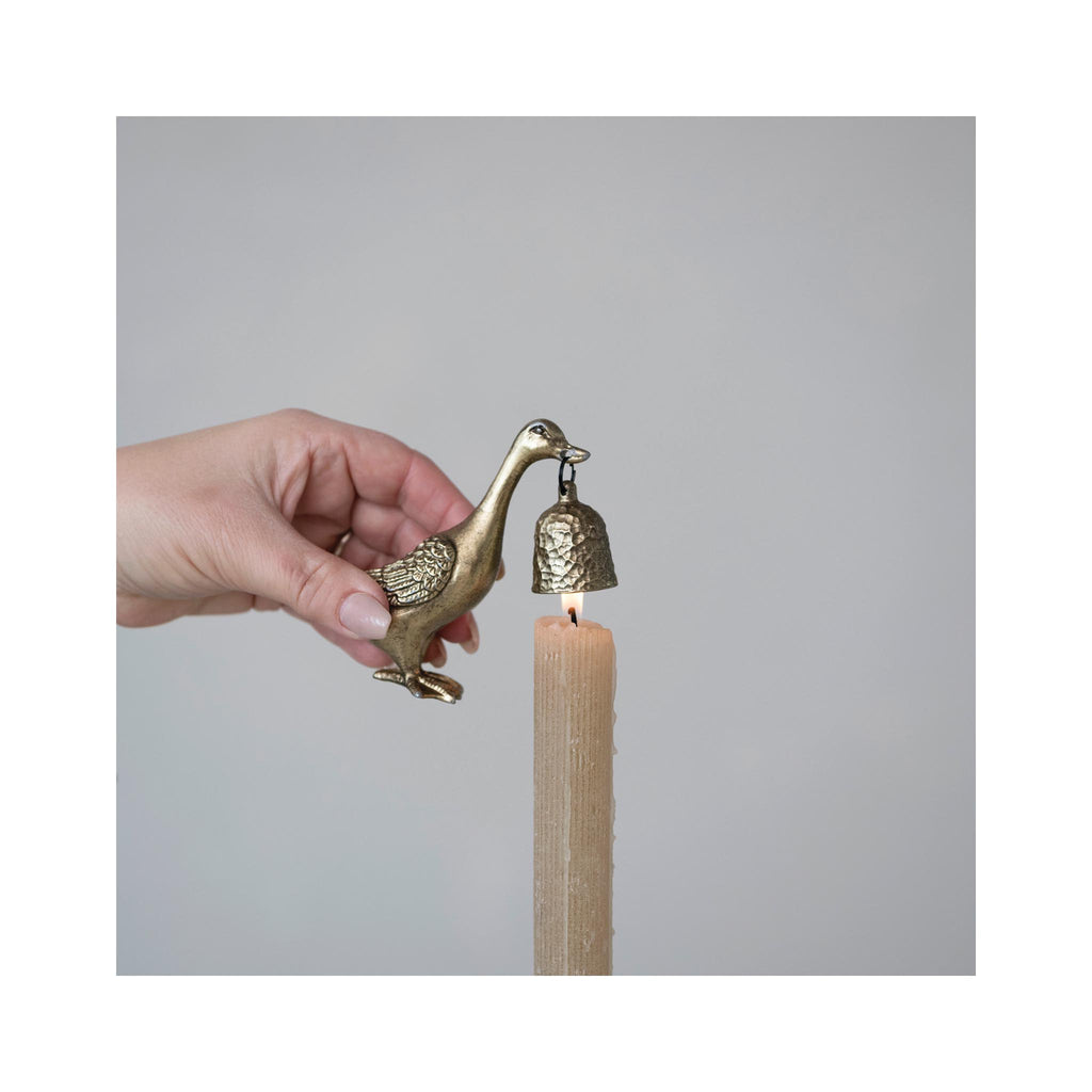 Pewter Duck Shaped Candle Snuffer - in use