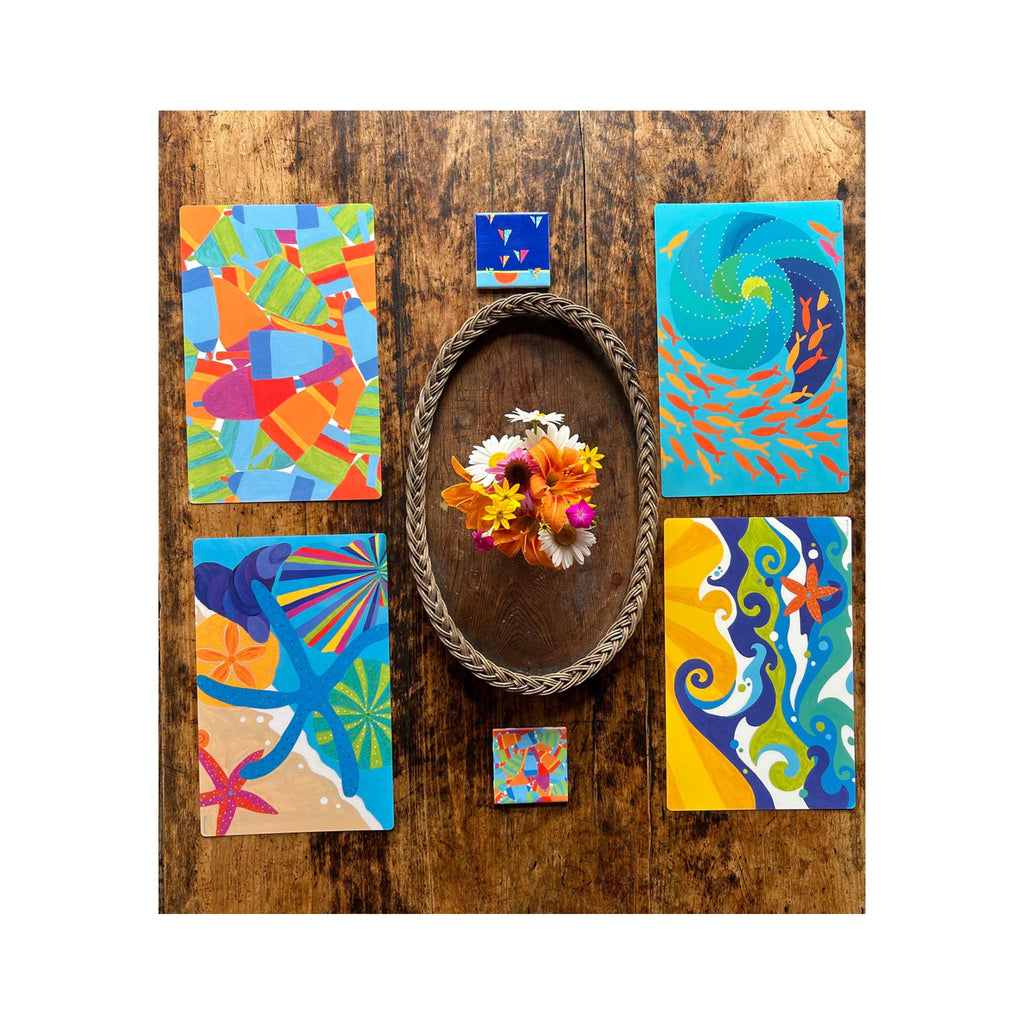 Festive Fish Wipeable Placemats - on table