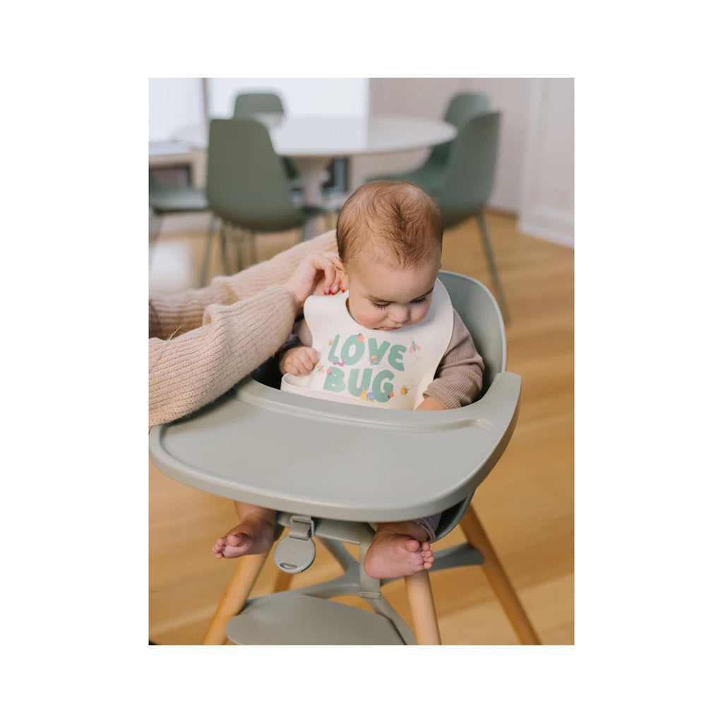 JuJuBe Silicone Bibs - Love Bug - on baby