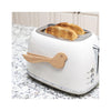 Bird Toaster Tongs - on toaster